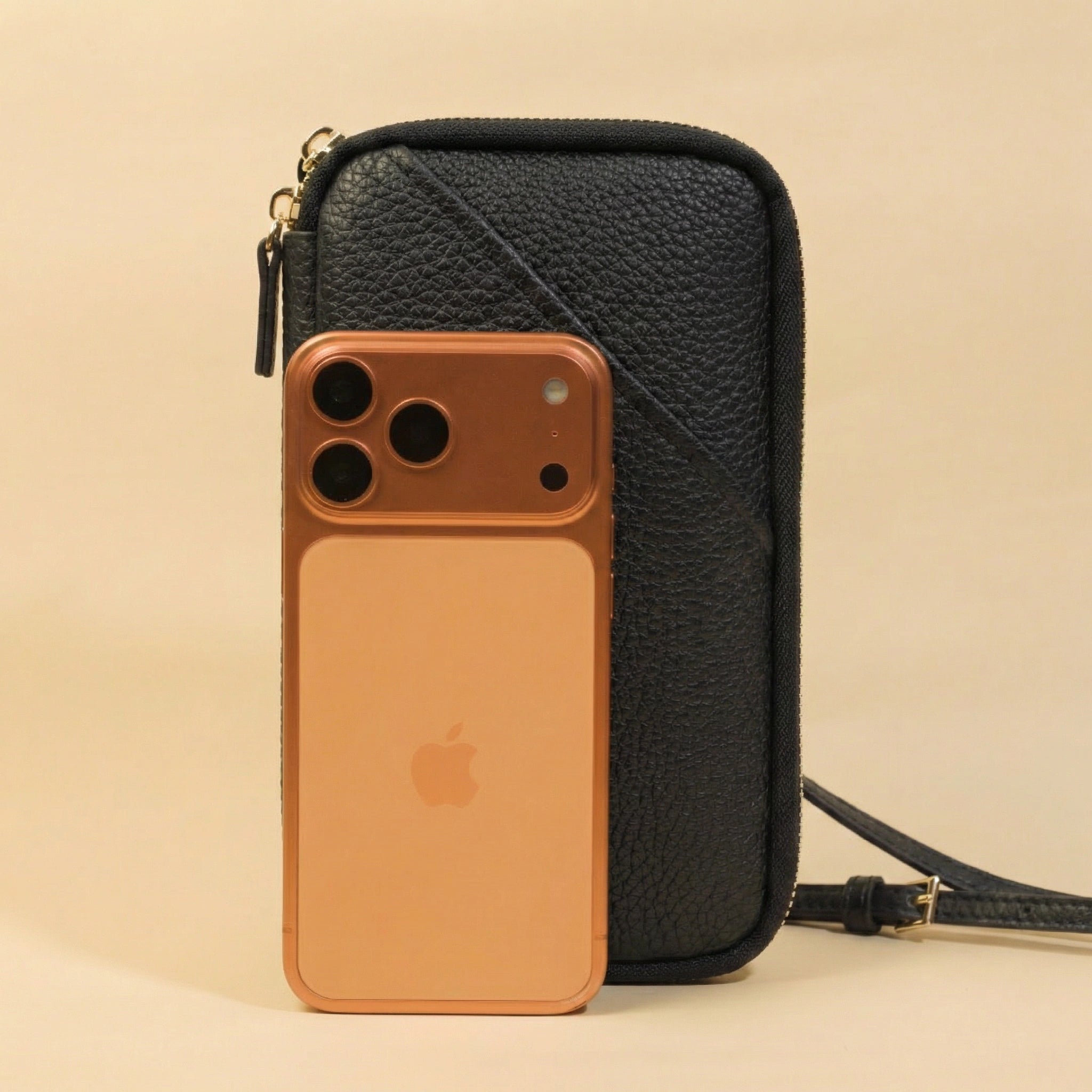 Phone bag with iPhone on a beige background