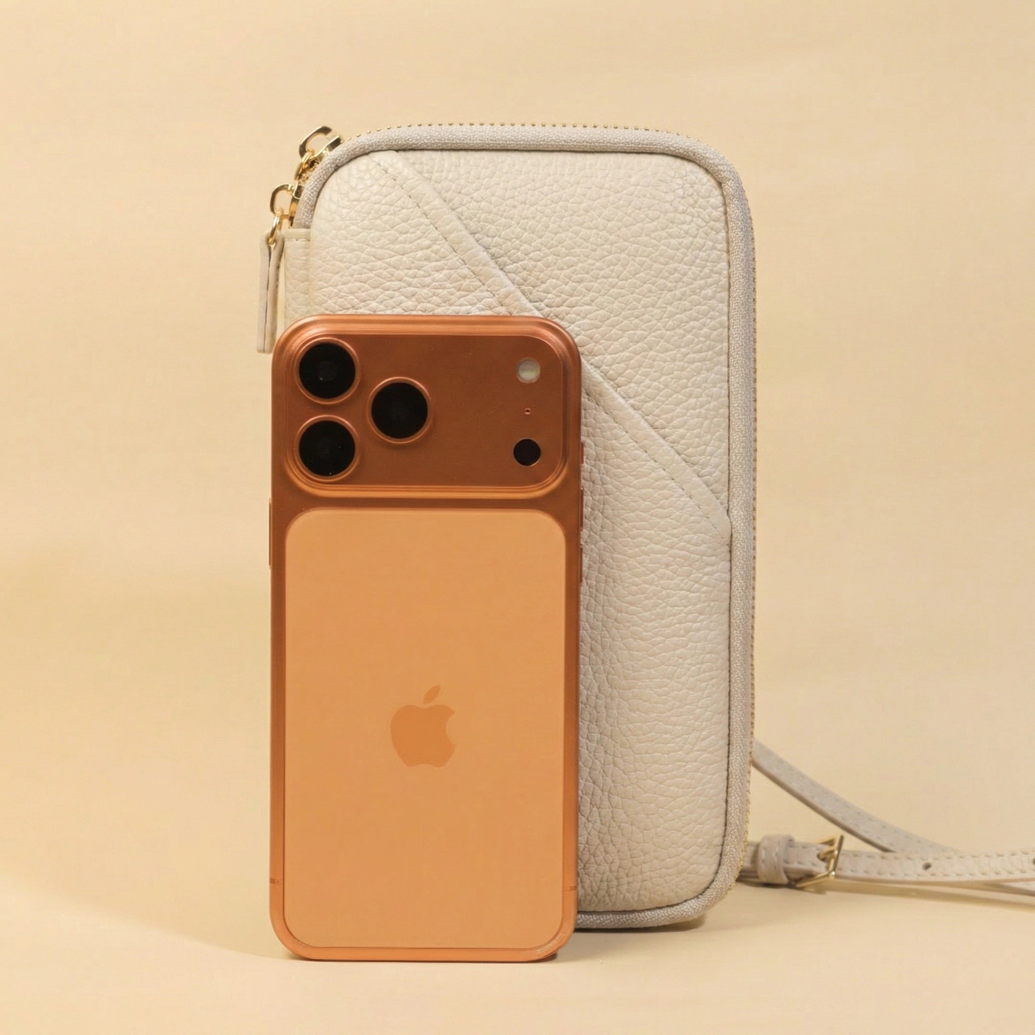 Phone Bag with iPhone on a beige background