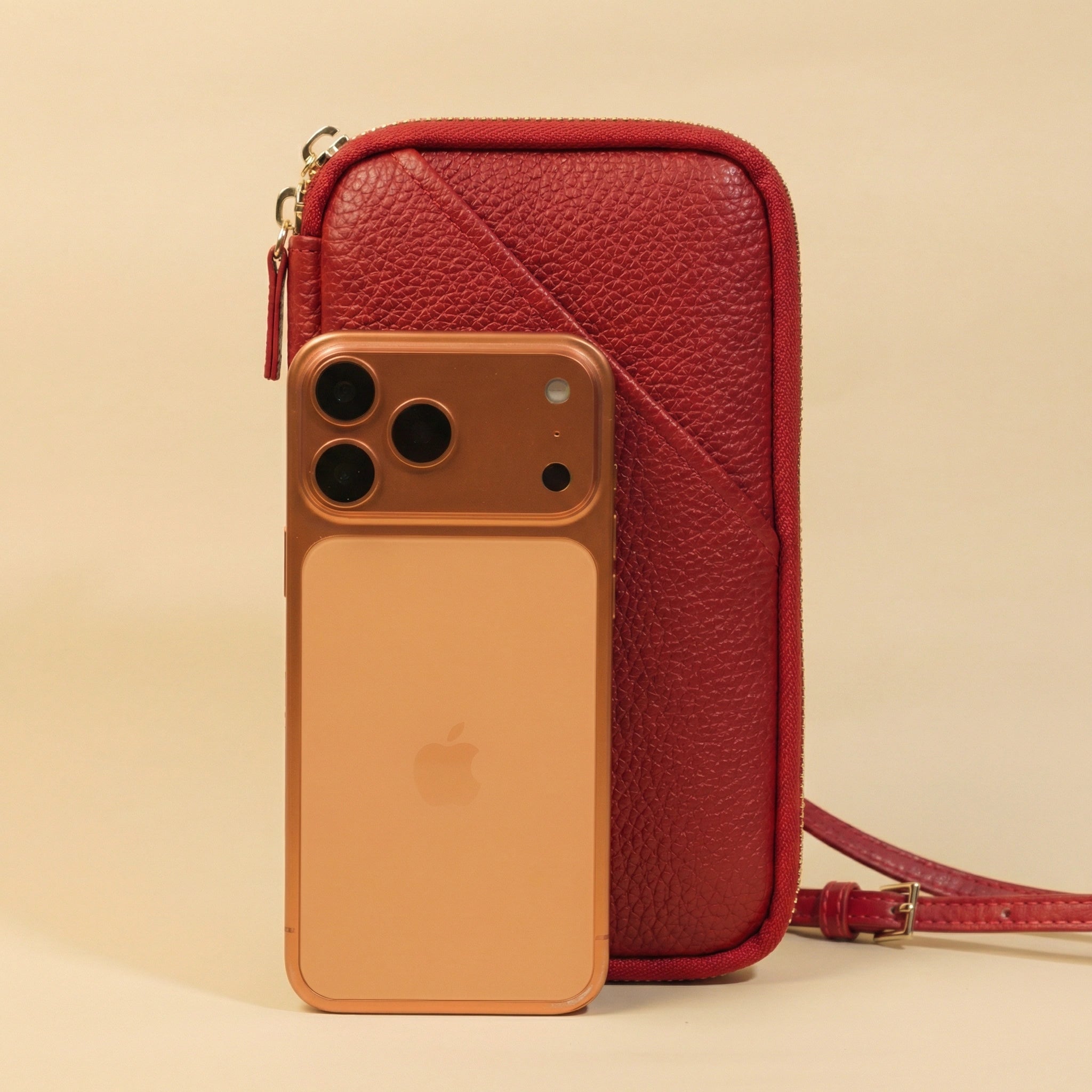 Phone Bag with iPhone on a beige background