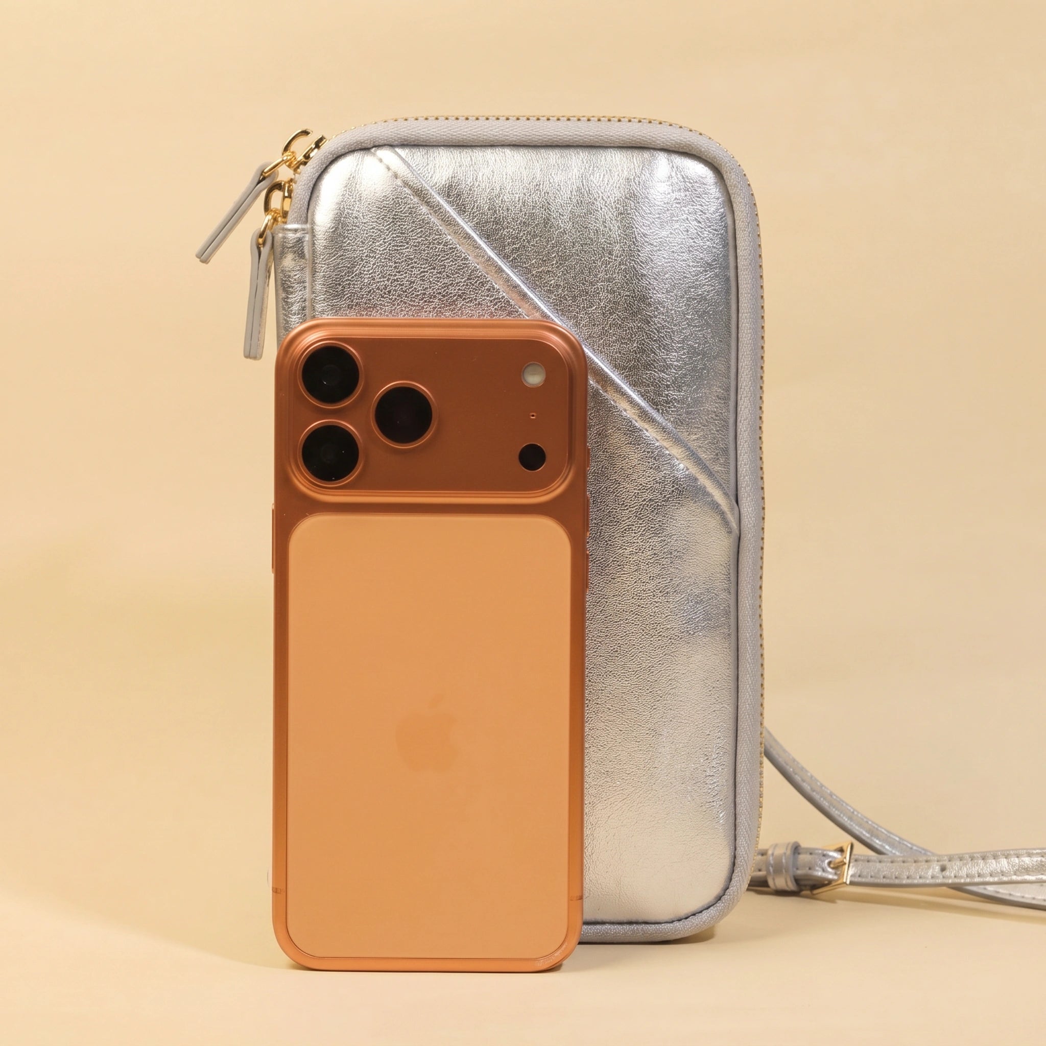 Phone Bag with iPhone on a beige background