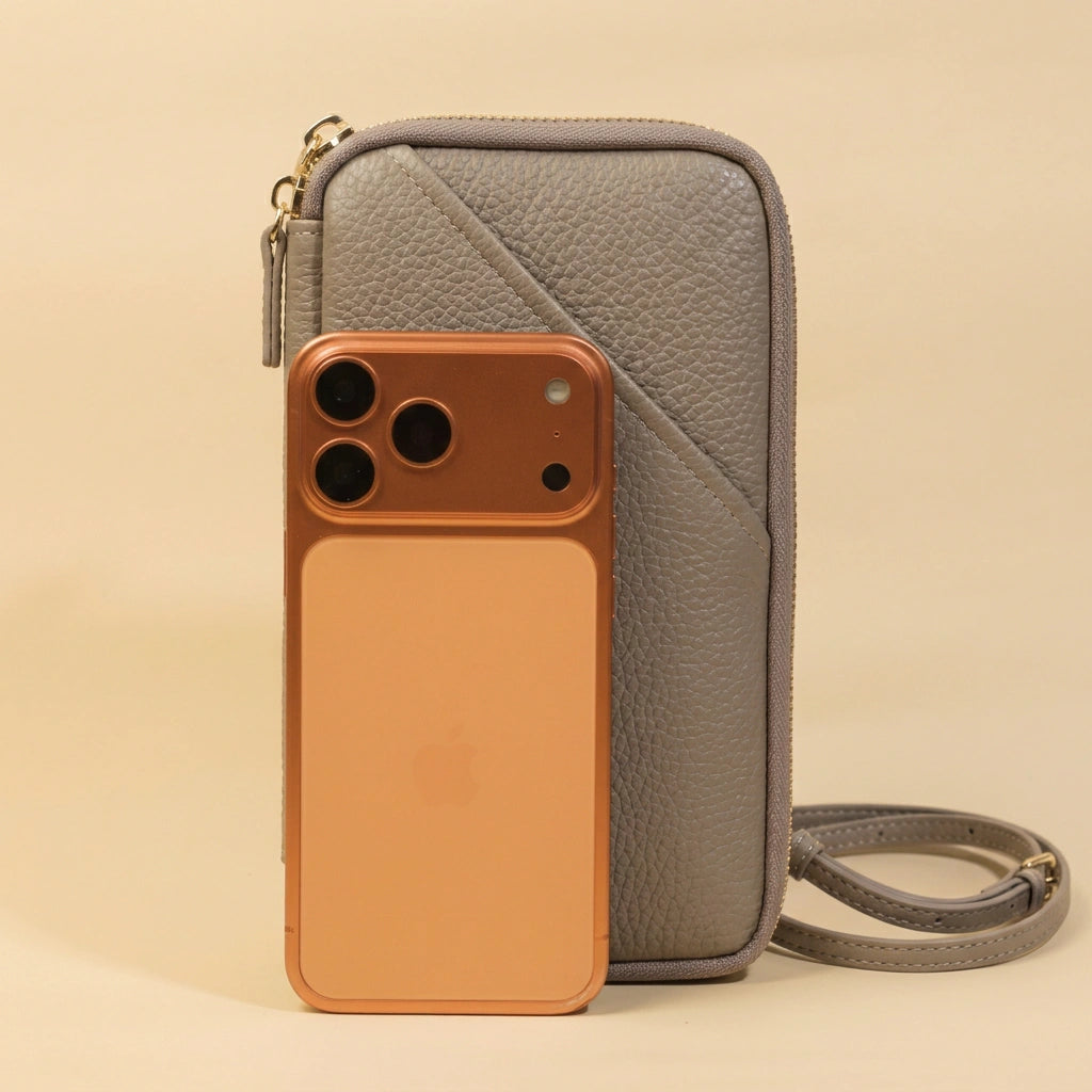 Phone Bag with iPhone on a beige background